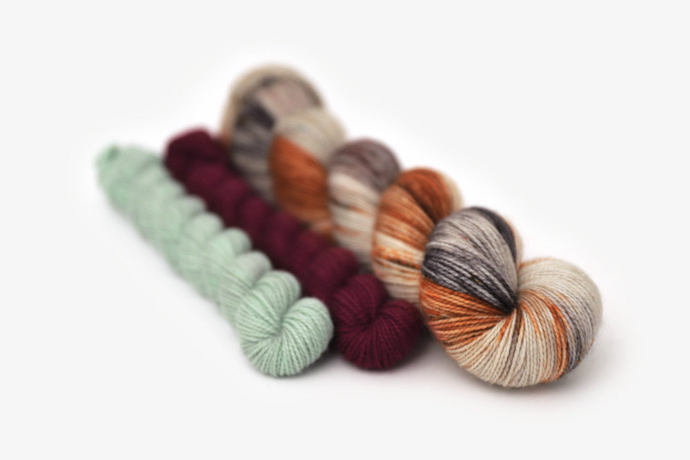 speckled hand dyed green orange purple gray sock set yarn