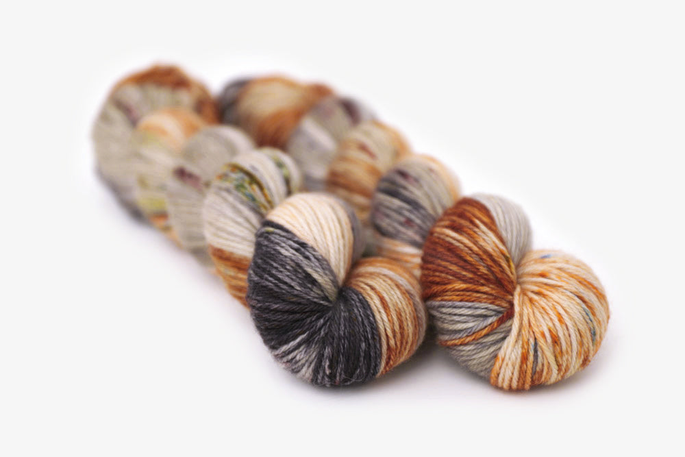 speckled hand dyed green orange purple gray worsted yarn