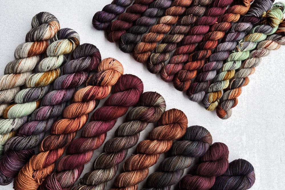 tonal speckled hand dyed orange red gray brown green yarn sets