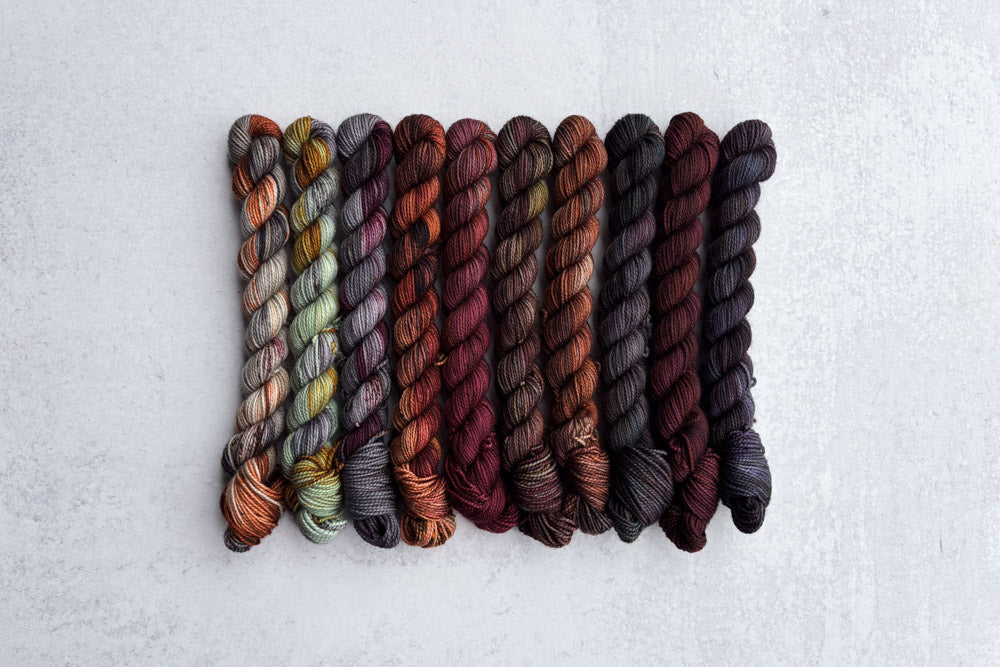 tonal speckled hand dyed orange red gray brown green yarn mini set