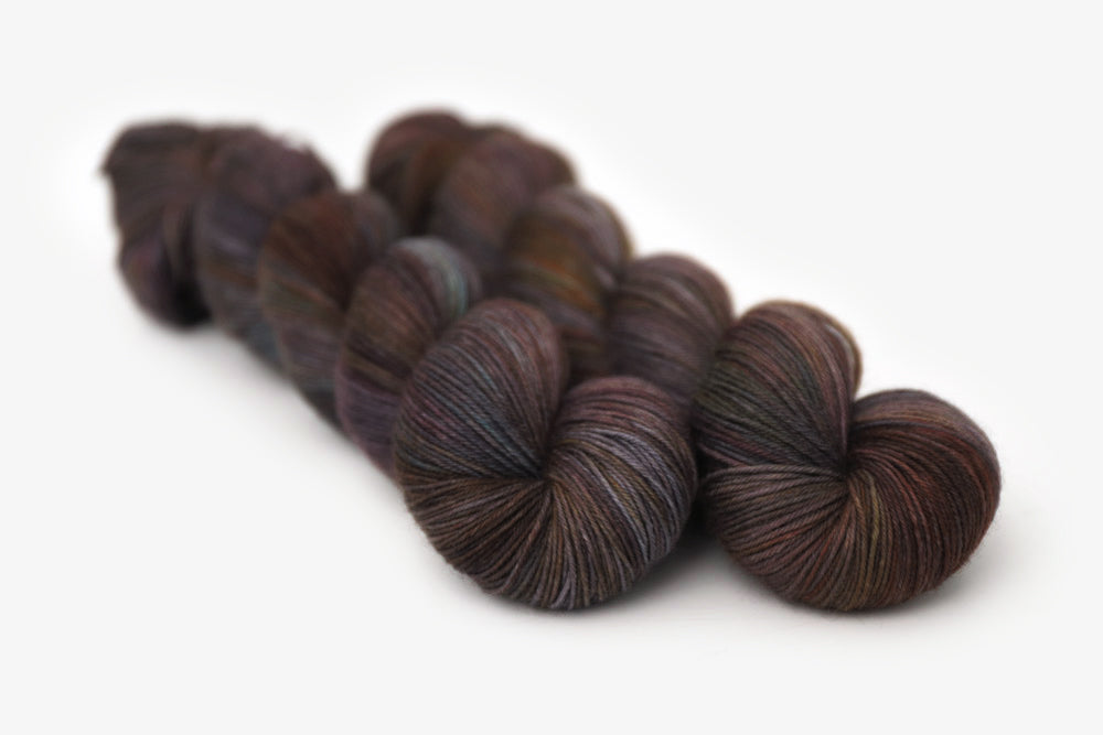 tonal hand dyed orange red gray brown phyllis sock yarn