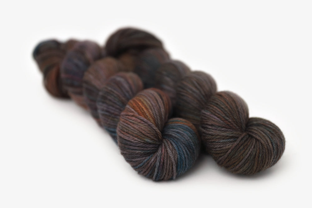 tonal hand dyed orange red gray brown worsted yarn