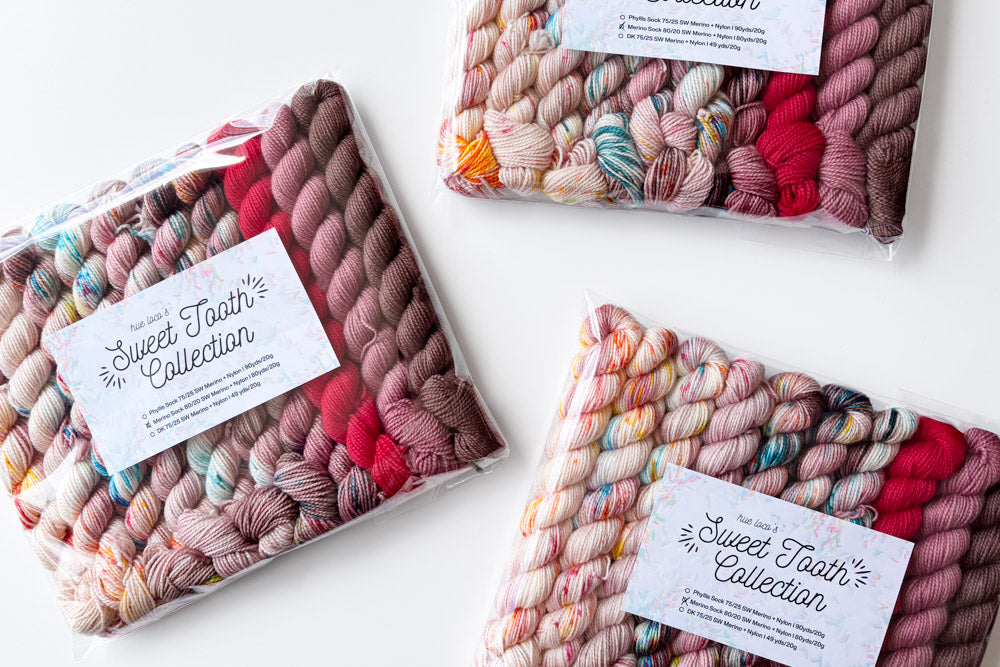 speckled semisolid hand dyed peach aqua fuchsia brown purple yarn set