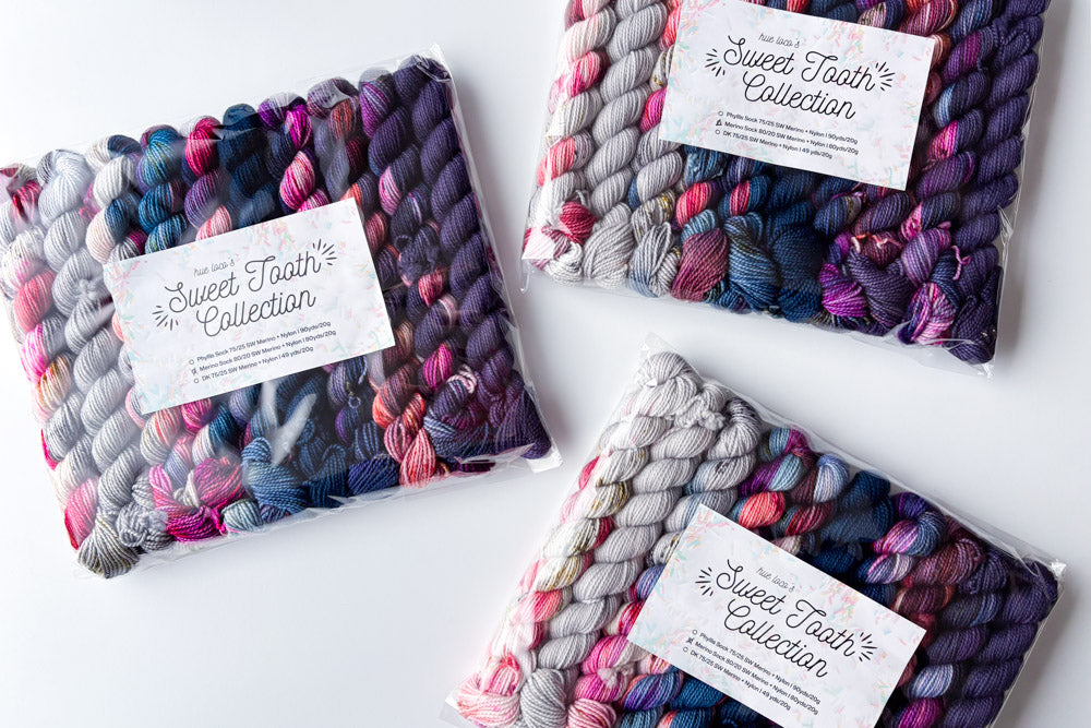 speckled semisolid hand dyed gray fuchsia blue purple yarn set