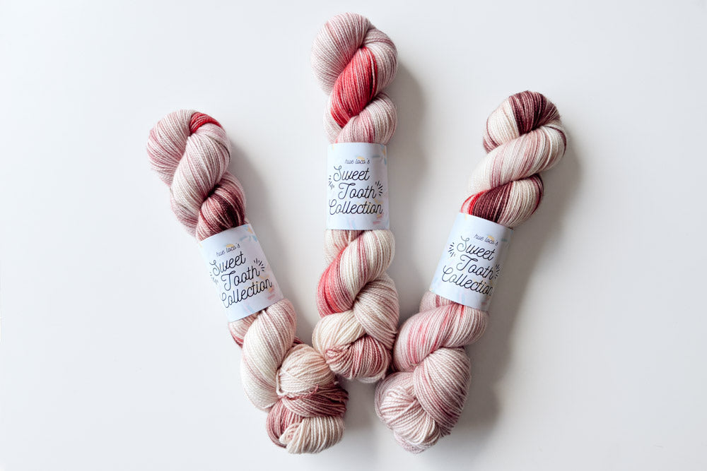 tonal hand dyed white pink fuchsia brown purple yarn 