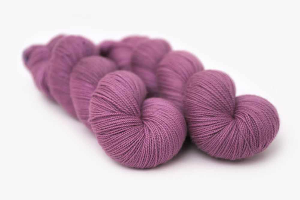 semisolid hand dyed plum (dusty mauve purple) spun xl yarn