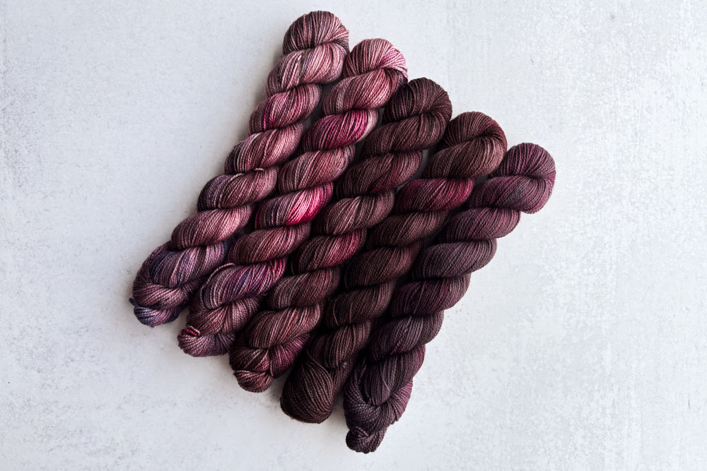 speckled hand dyed pink dark mauve maroon brown yarn 50s set