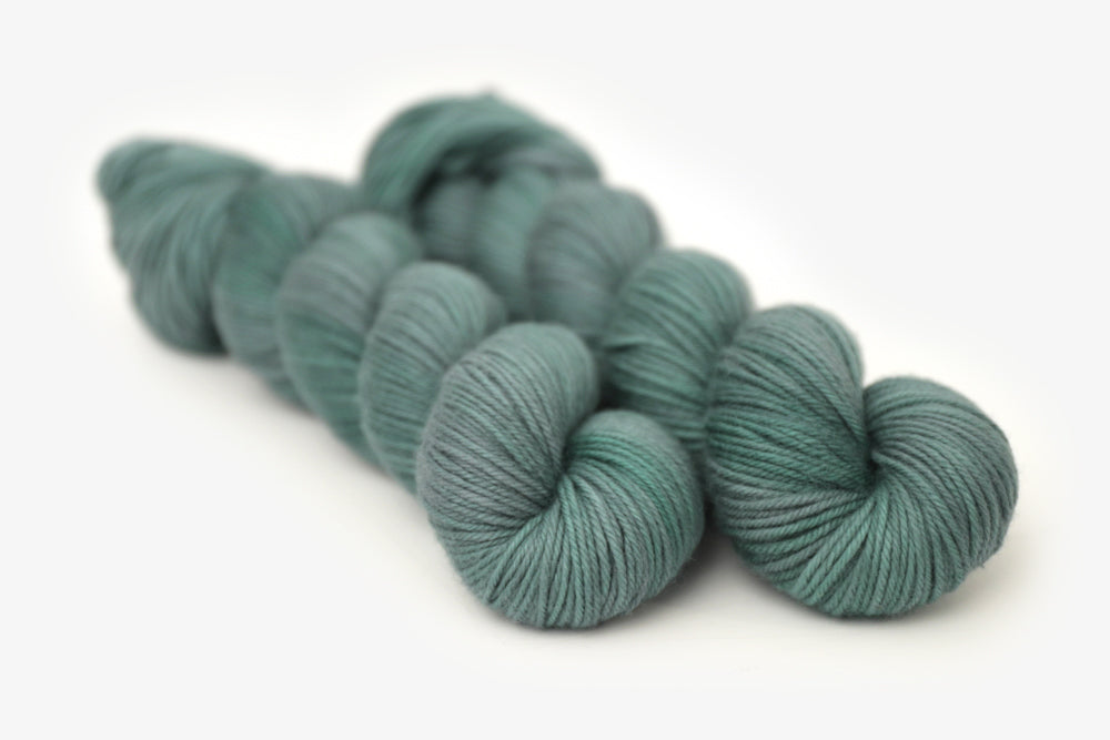 semisolid hand dyed sage green dk yarn