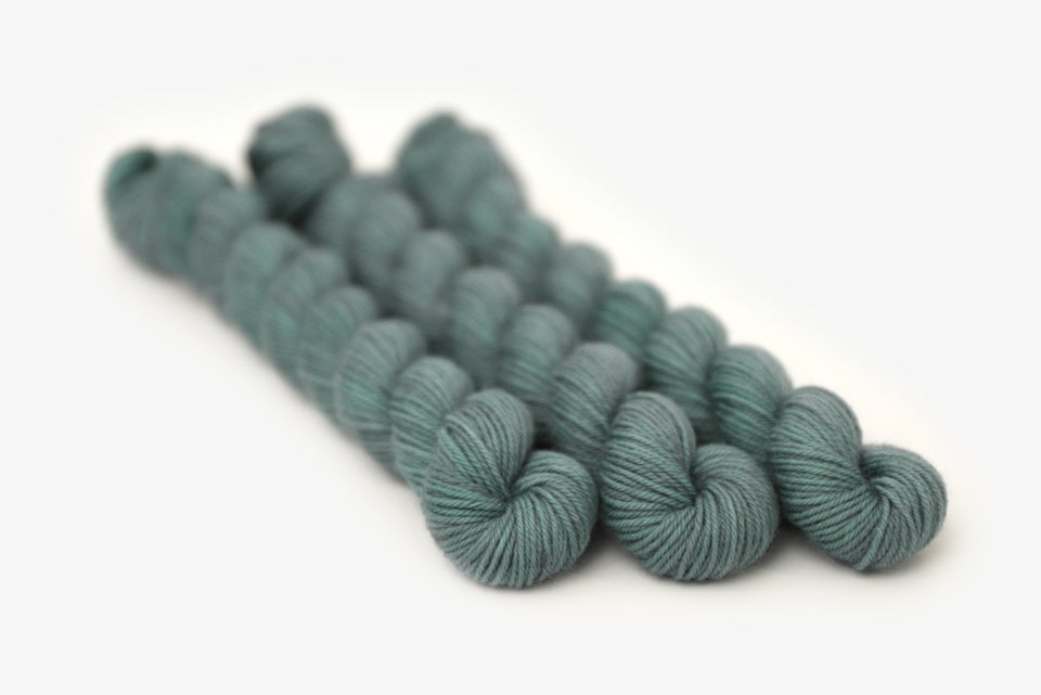 semisolid hand dyed sage green phyllis sock mini yarn