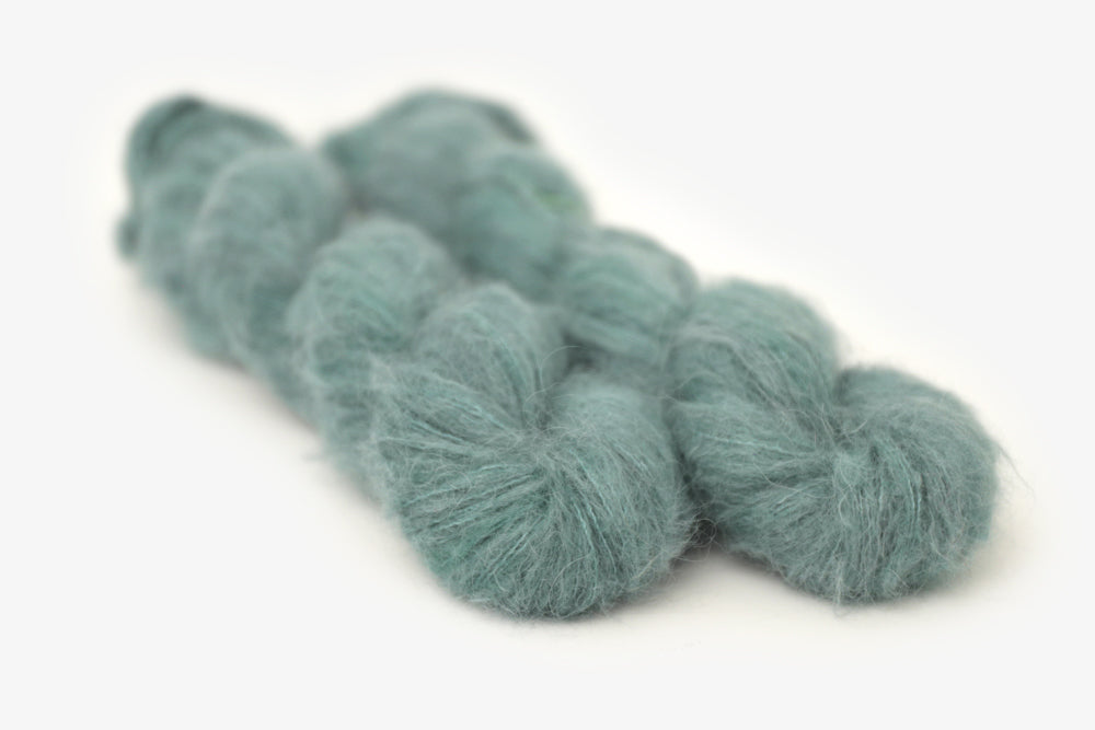 semisolid hand dyed sage green alpaca suri lace yarn