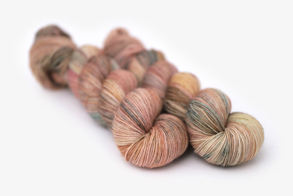 tonal peach blush ochre teal phyllis sock yarn