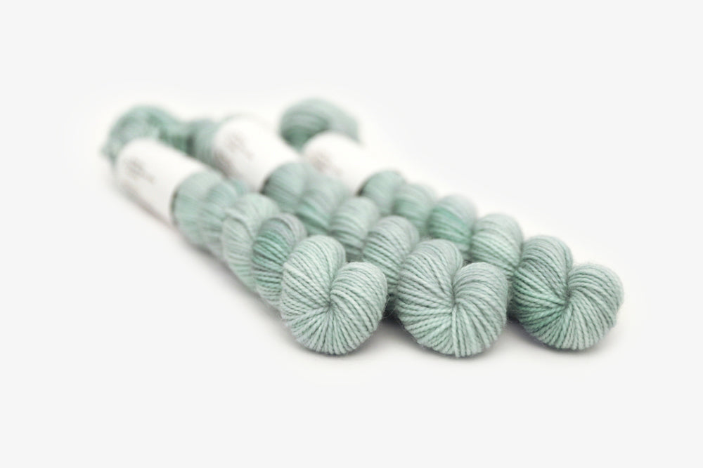 semisolid hand dyed light powder blue merino sock mini yarn