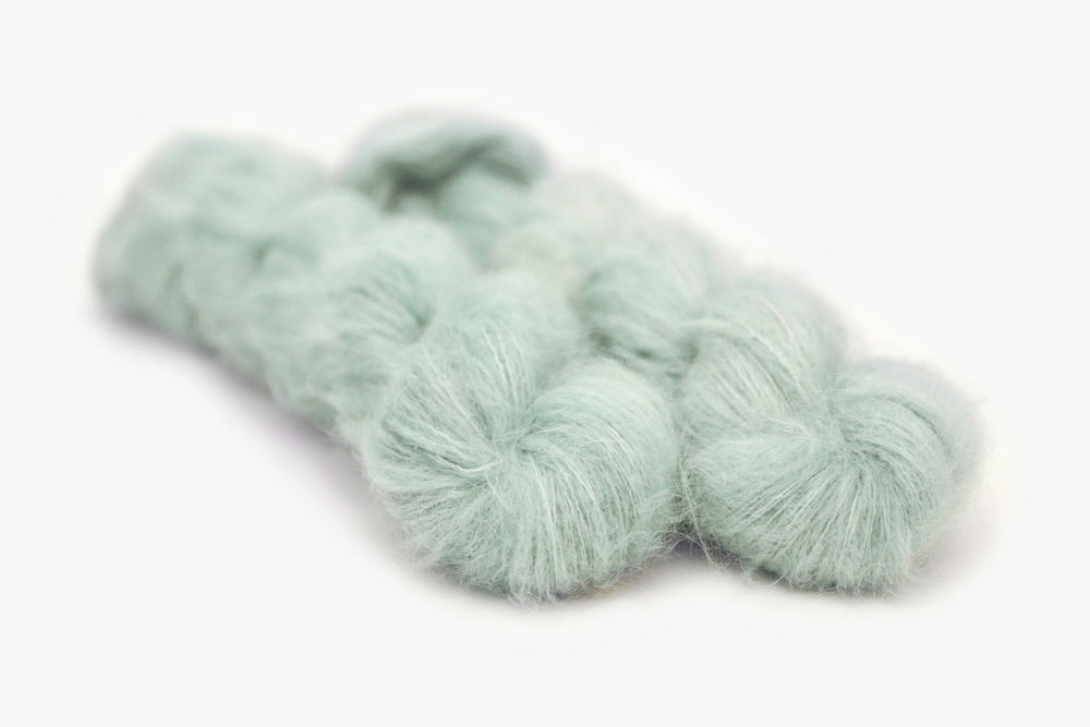 semisolid hand dyed light powder blue alpaca suri lace yarn