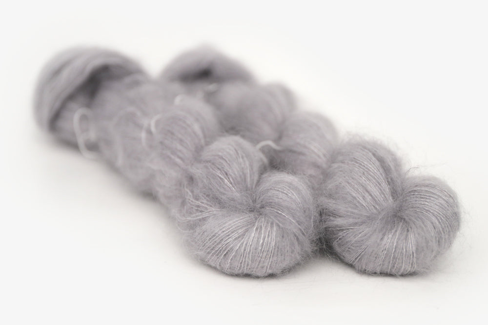 semisolid hand dyed ash (light silver gray) mohair lace yarn