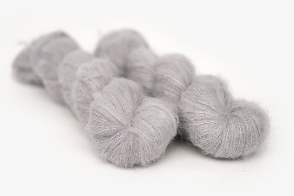 semisolid hand dyed ash (light silver gray) alpaca suri lace yarn