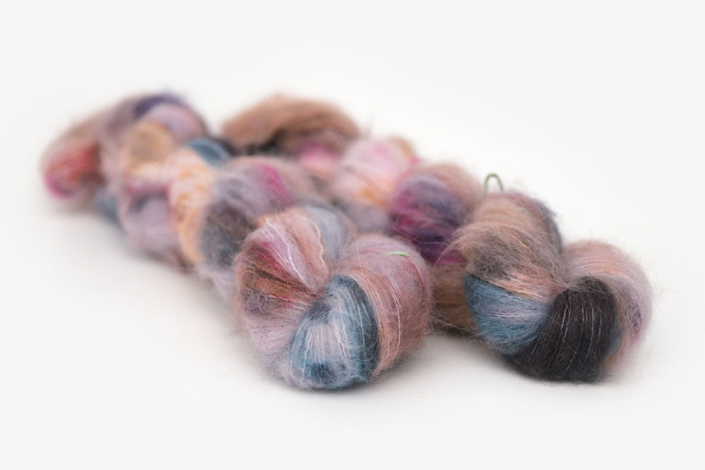 speckled hand dyed lilac teal magenta brown alpaca suri lace yarn