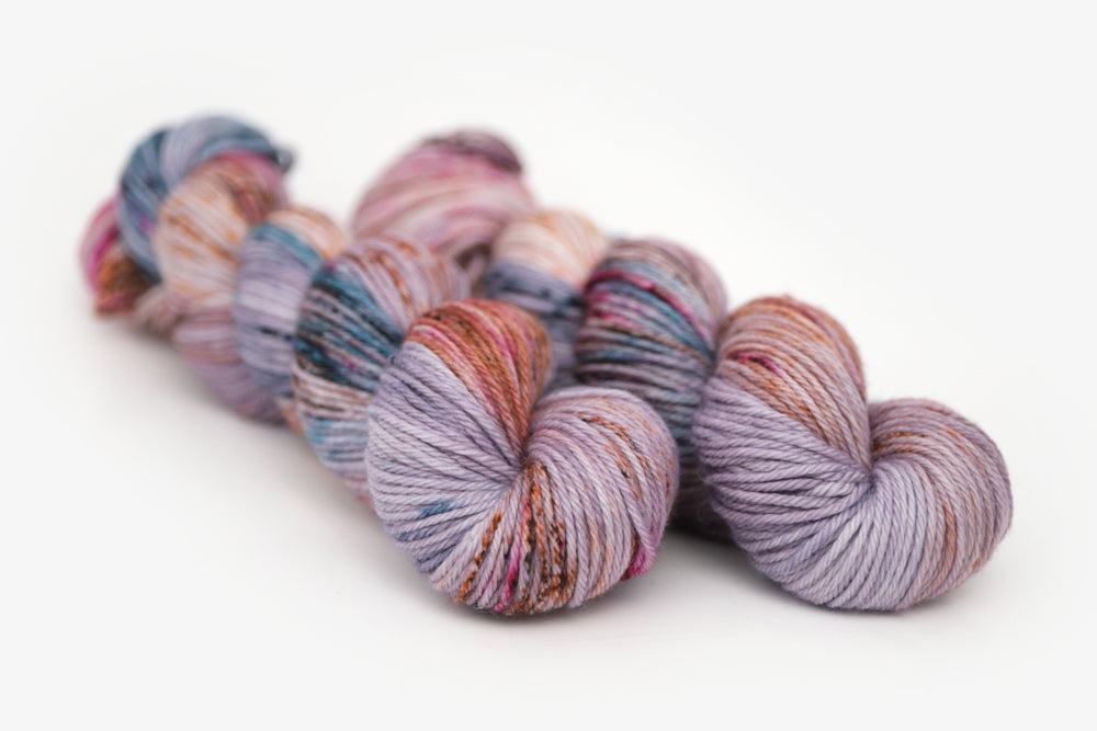speckled hand dyed lilac teal magenta brown worsted yarn