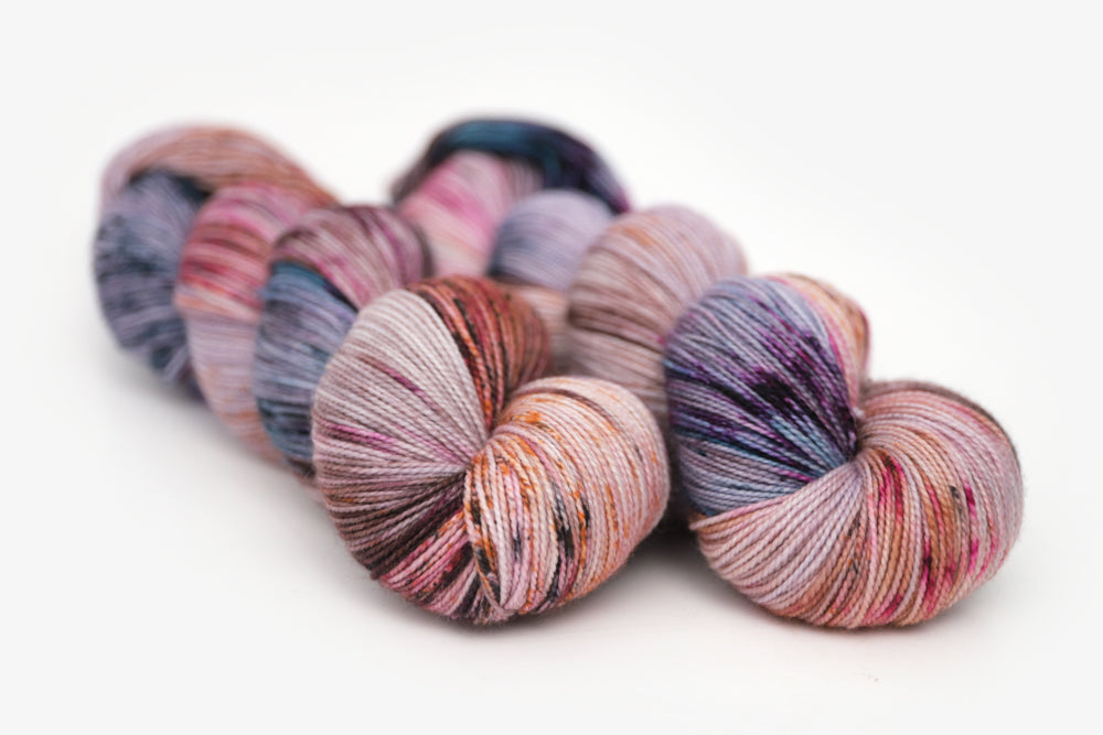 speckled hand dyed lilac teal magenta brown spun xl yarn
