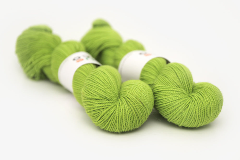 semisolid hand dyed chartreuse (bright lime green) merino sock yarn
