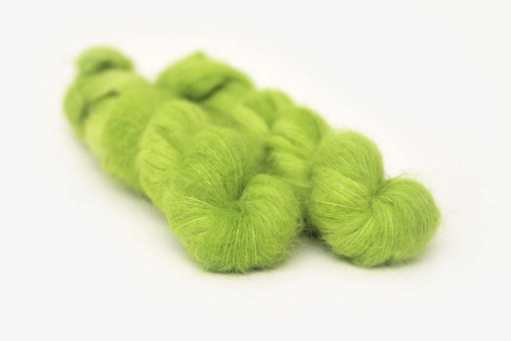semisolid hand dyed chartreuse (bright lime green) alpaca suri lace yarn