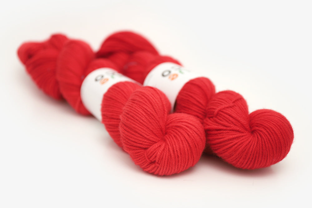 semisolid hand dyed cherry (bright christmas red) dk yarn