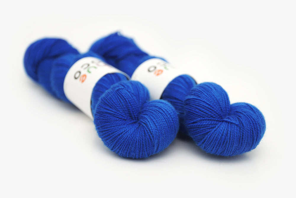 semisolid hand dyed cobalt (bright royal blue) merino sock yarn