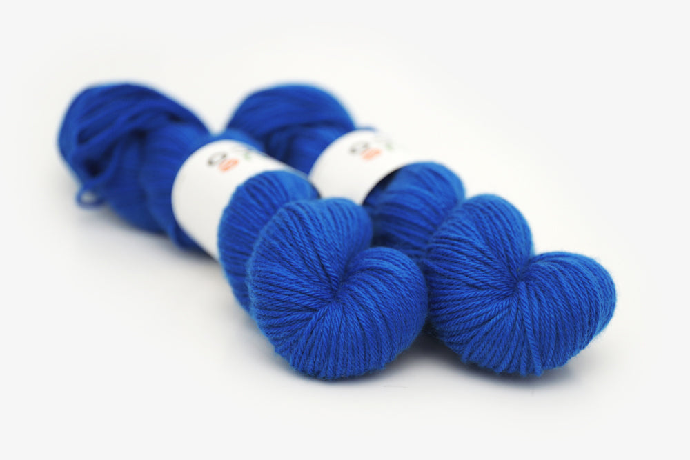semisolid hand dyed cobalt (bright royal blue) worsted yarn