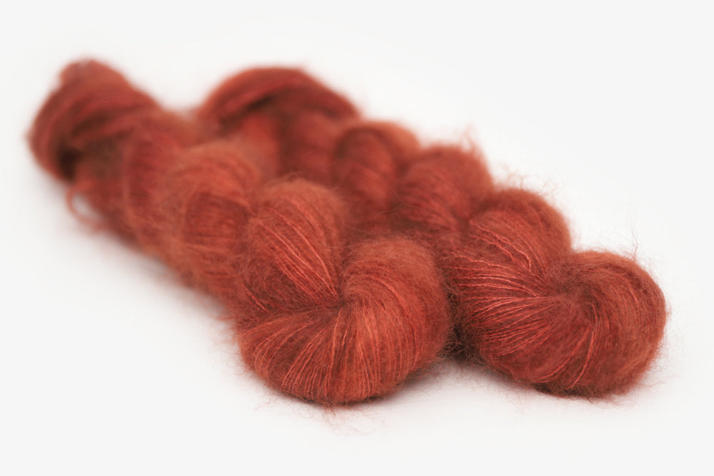 semisolid hand dyed dark rust red mohair lace yarn