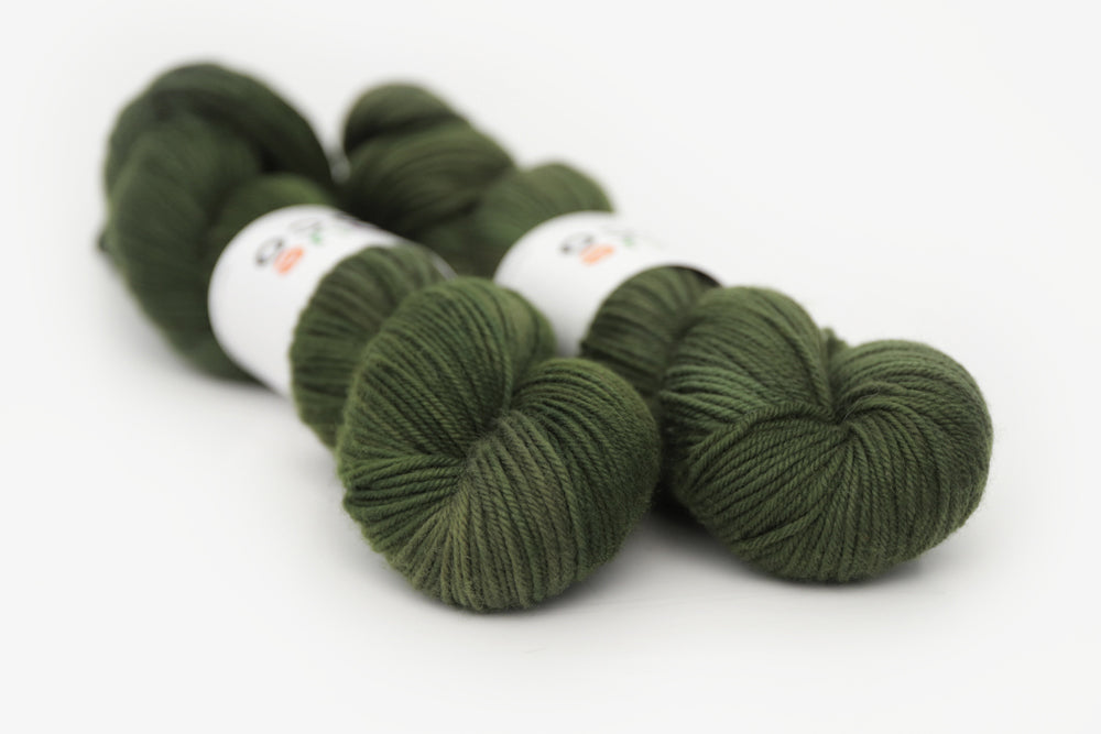 semisolid hand dyed dark forest green dk yarn