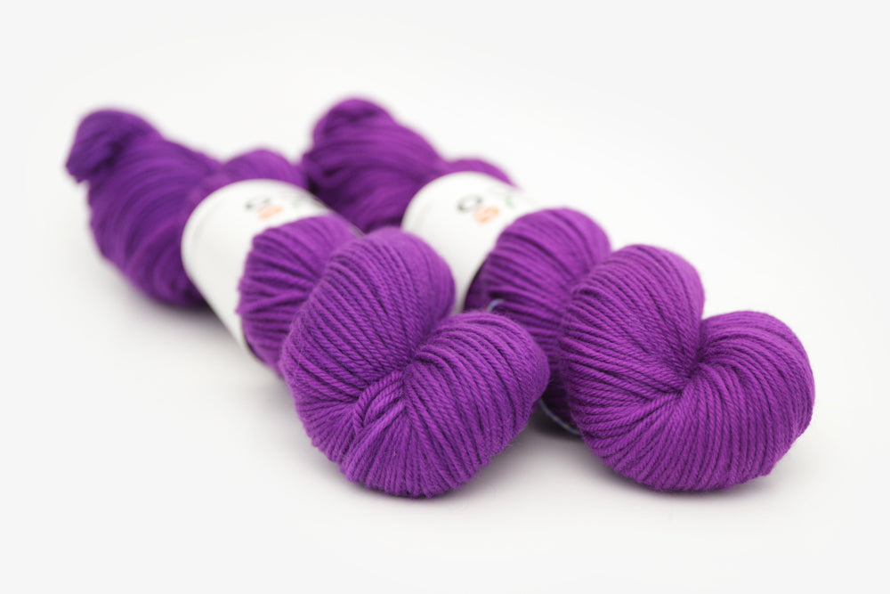 semisolid hand dyed bright pink purple dk yarn