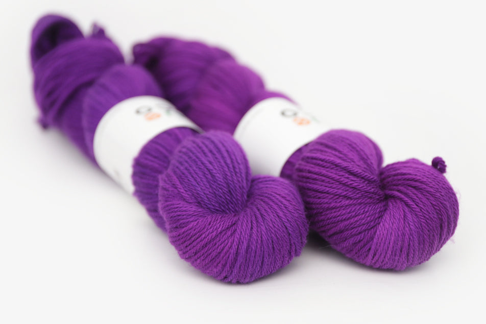 semisolid hand dyed bright pink purple worsted yarn