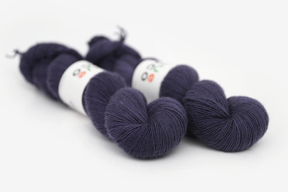 semisolid hand dyed juniper (dark navy purple blue) single sock yarn