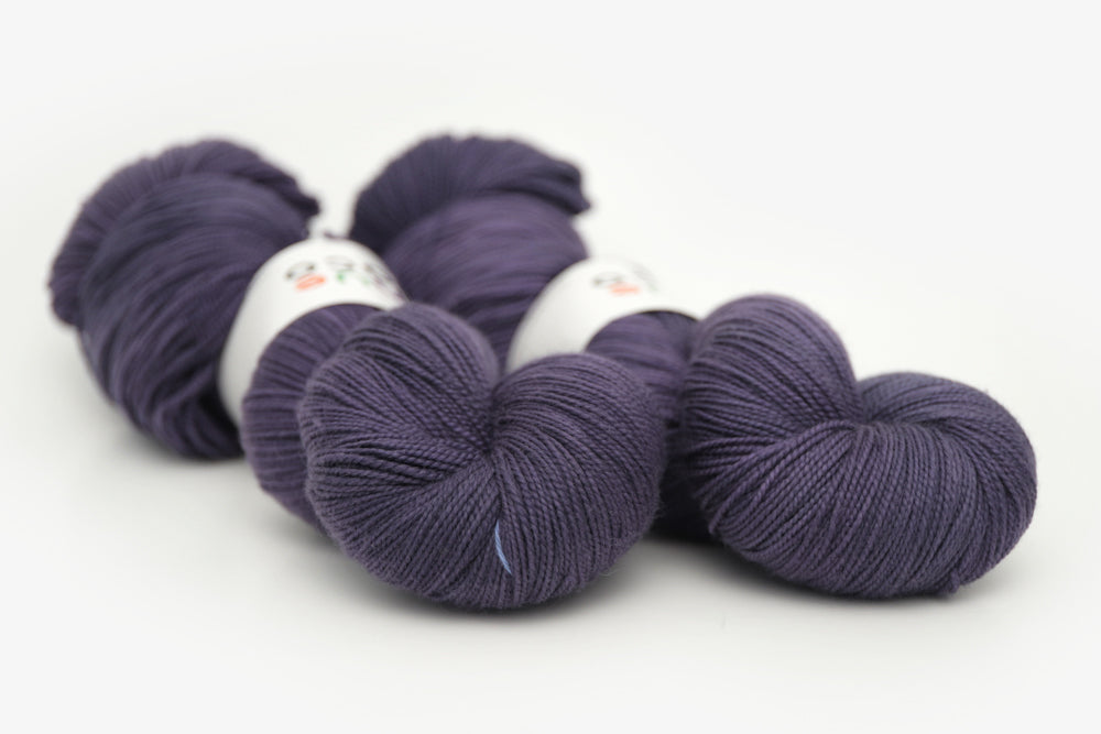 semisolid hand dyed juniper (dark navy purple blue) spun xl yarn