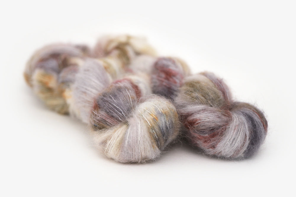 speckled hand dyed warm white gray brown maroon alpaca suri lace yarn