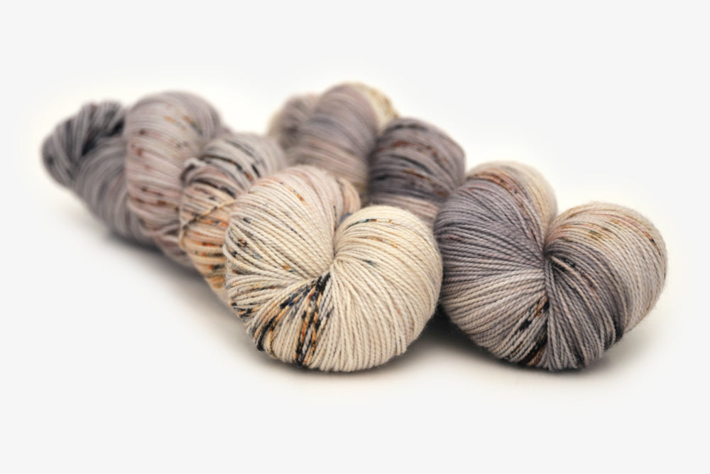 speckled hand dyed warm white gray brown maroon spun xl yarn