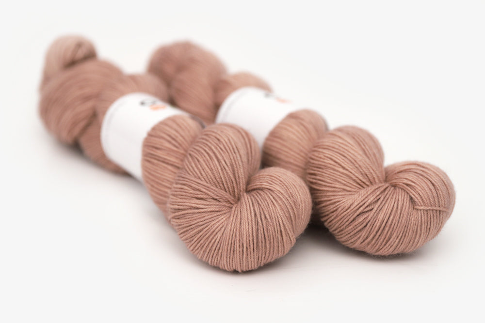 semisolid hand dyed mauve (taupe) phyllis  sock yarn