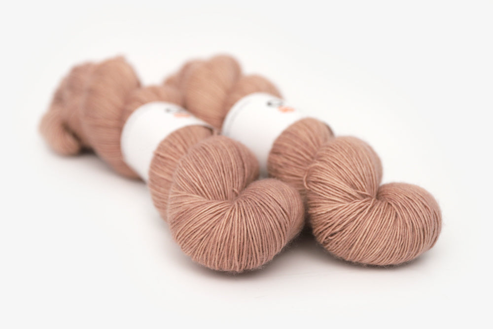semisolid hand dyed mauve (taupe) single sock yarn