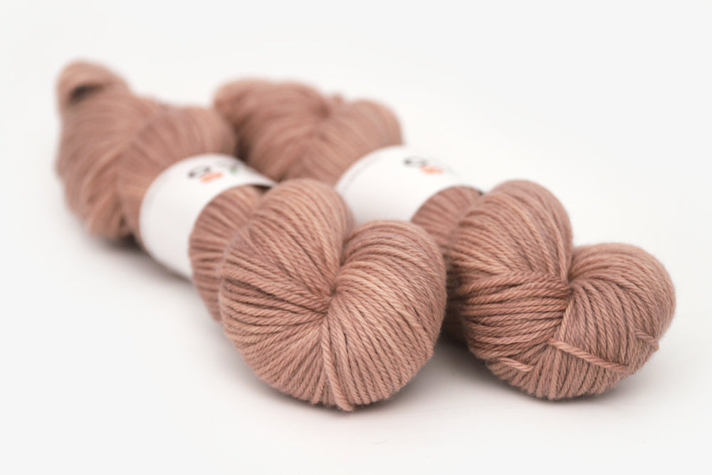 semisolid hand dyed mauve (taupe) worsted yarn