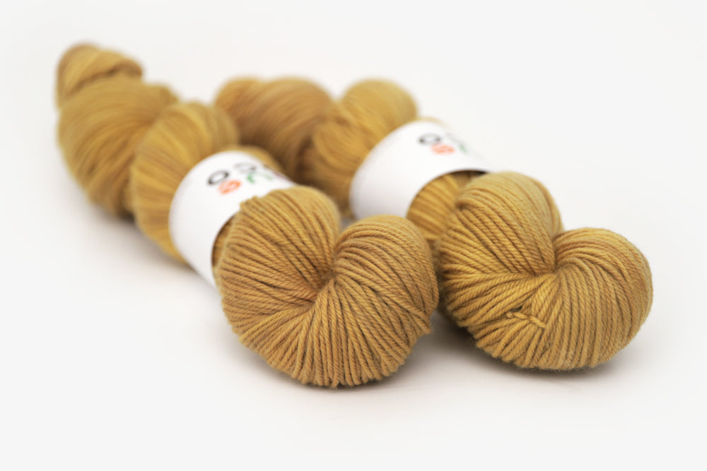 semisolid hand dyed ochre (dark bronze yellow) dk yarn
