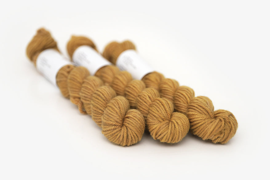 semisolid hand dyed ochre (dark bronze yellow) dk mini yarn