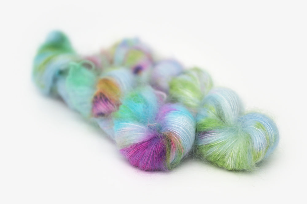 speckled hand dyed bright aqua green purple mohair lace yarn