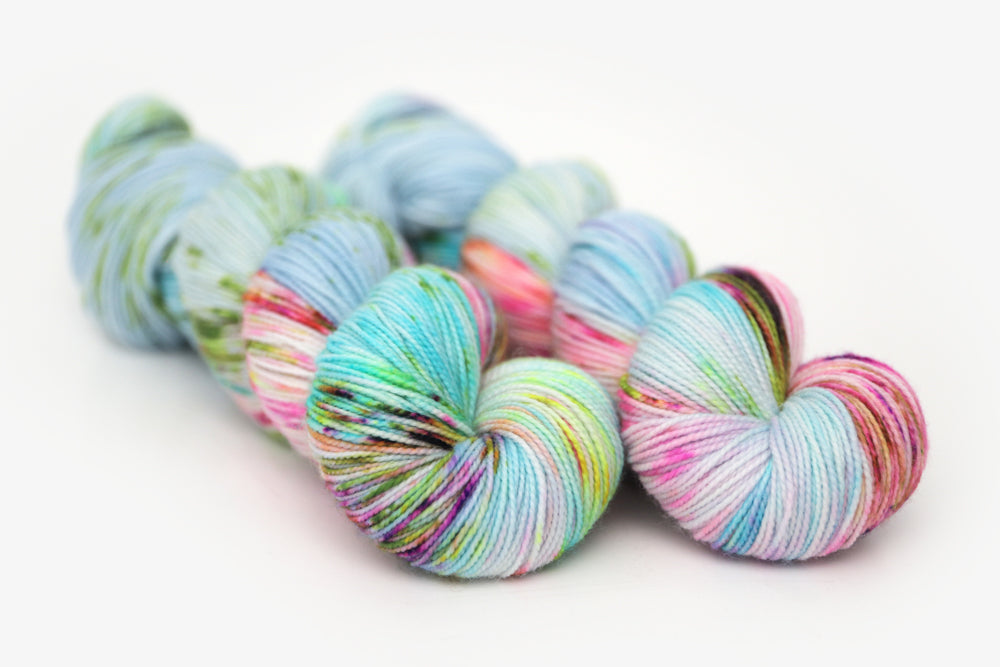 speckled hand dyed bright aqua green purple spun xl yarn