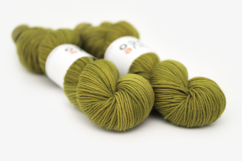 semisolid hand dyed pear (dark olive yellow green) dk yarn