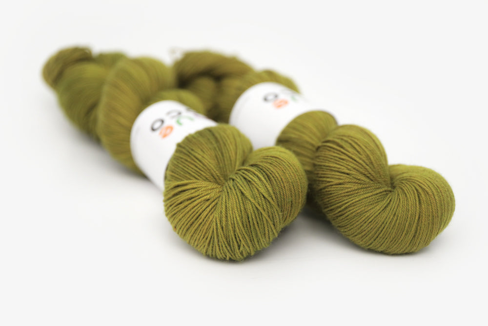 semisolid hand dyed pear (dark olive yellow green) phyllis sock yarn