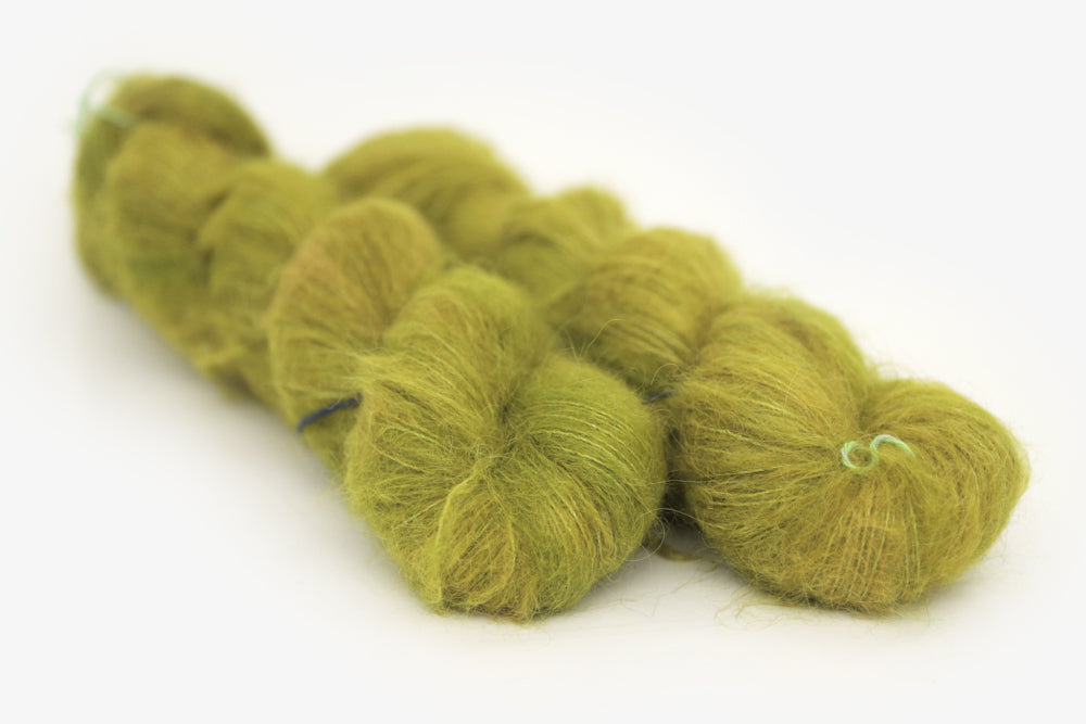 semisolid hand dyed pear (dark olive yellow green) alpaca suri lace yarn