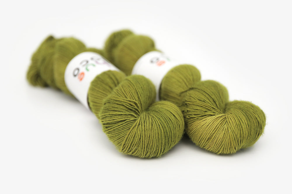 semisolid hand dyed pear (dark olive yellow green) single sock yarn