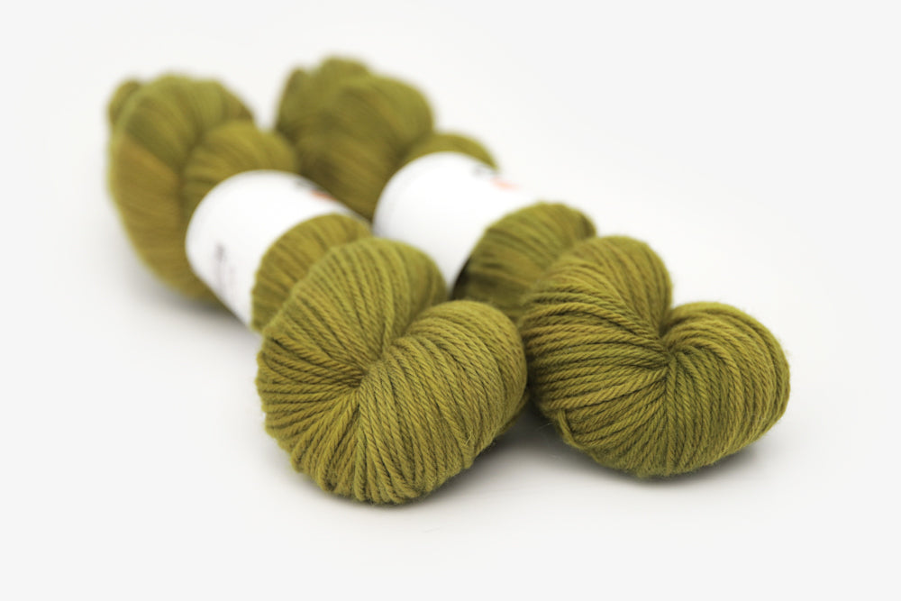 semisolid hand dyed pear (dark olive yellow green) worsted yarn