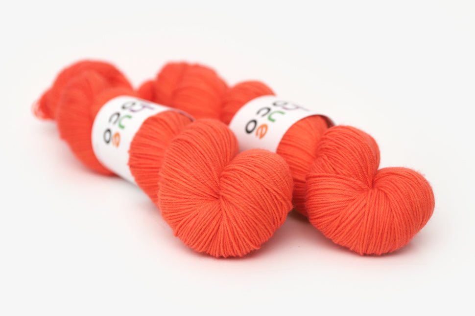 semisolid hand dyed poppy (bright orange red) phyllis sock yarn