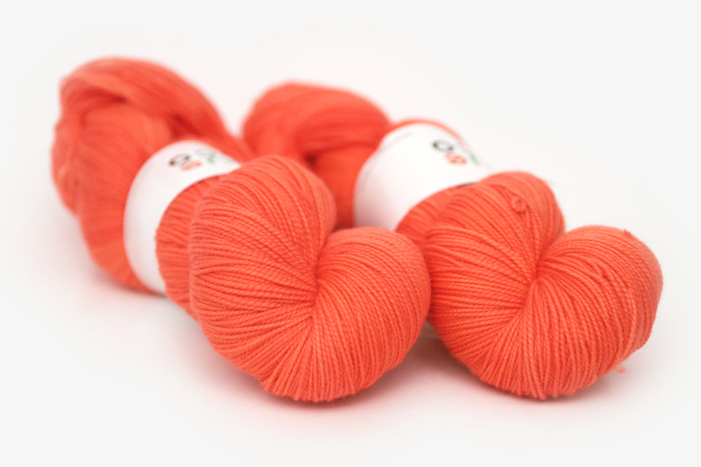 semisolid hand dyed poppy (bright orange red) spun xl yarn
