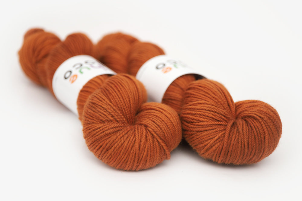 semisolid hand dyed pumpkin (dark burnt orange) dk yarn